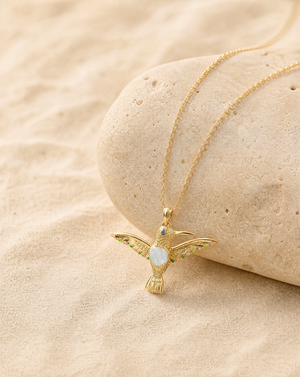 The Hummingbird Clear Quartz Pendant — Gold